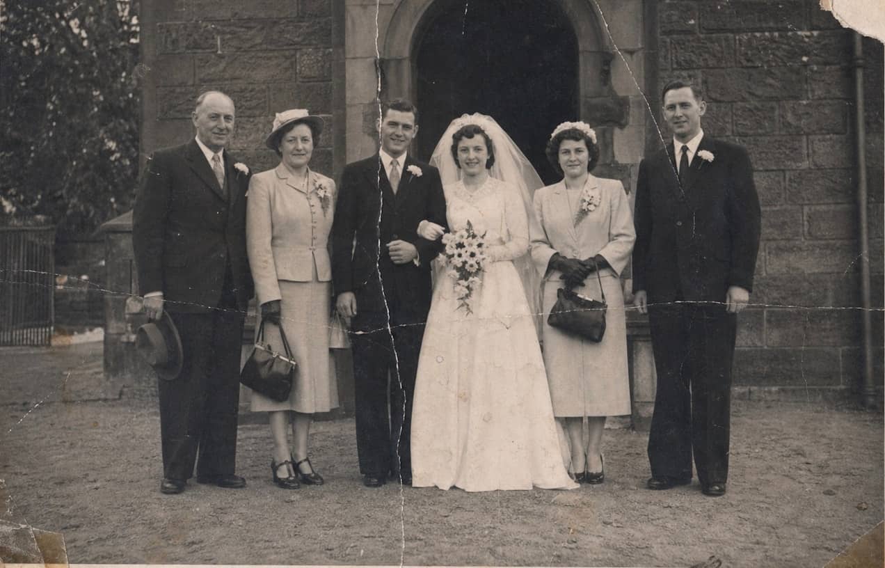Original wedding photo before restoration.