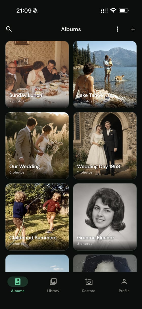 PhotoScanRestore iPhone app Albums screen with restored family albums such as Sunday Lunch and Wedding Day 1958.