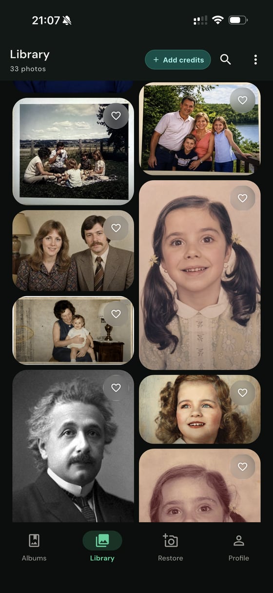 PhotoScanRestore iPhone app Library showing 33 saved family photos in a grid.